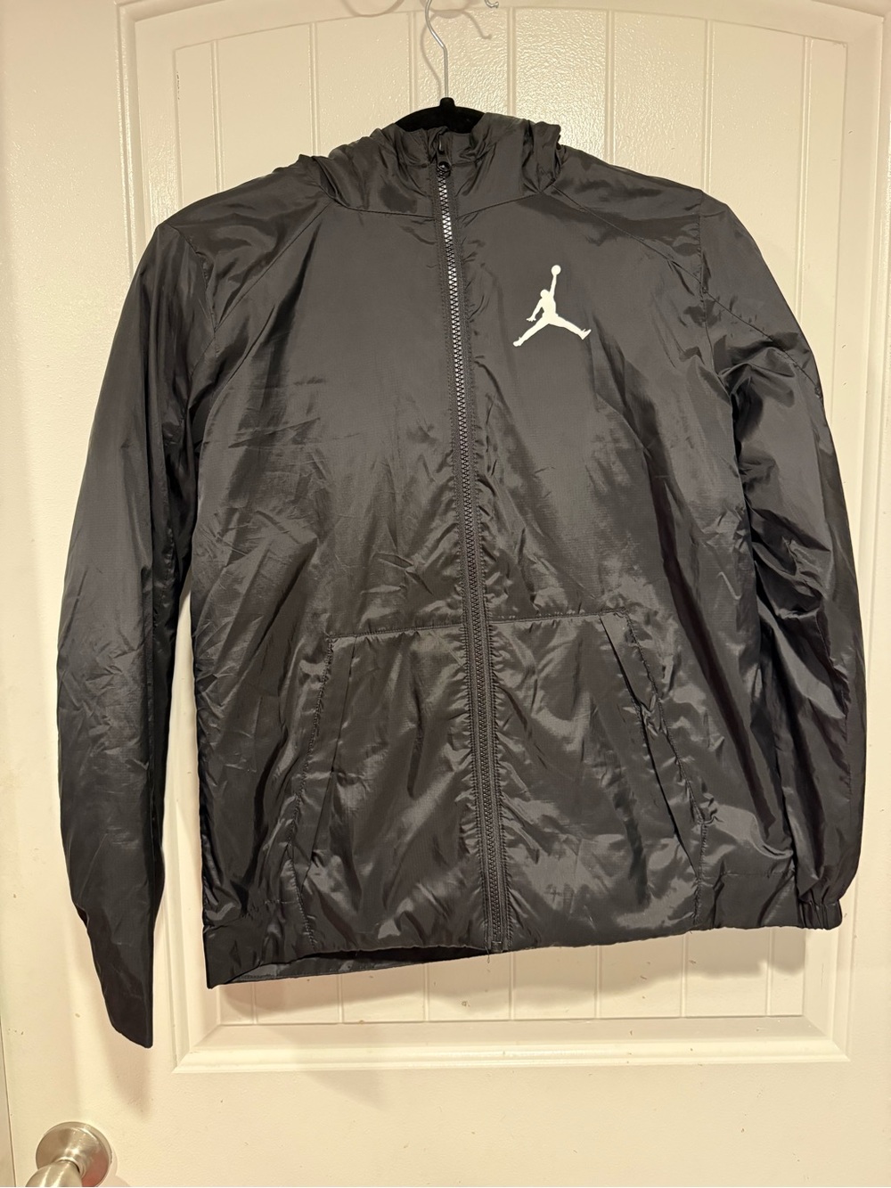 Jordan Kid’s Large Black Hooded Windbreaker with White Jumpman Logo